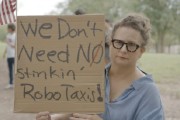 司法考试特斯拉在得州奥斯汀遭遇抗议活动：反对马斯克Robotaxi计划
